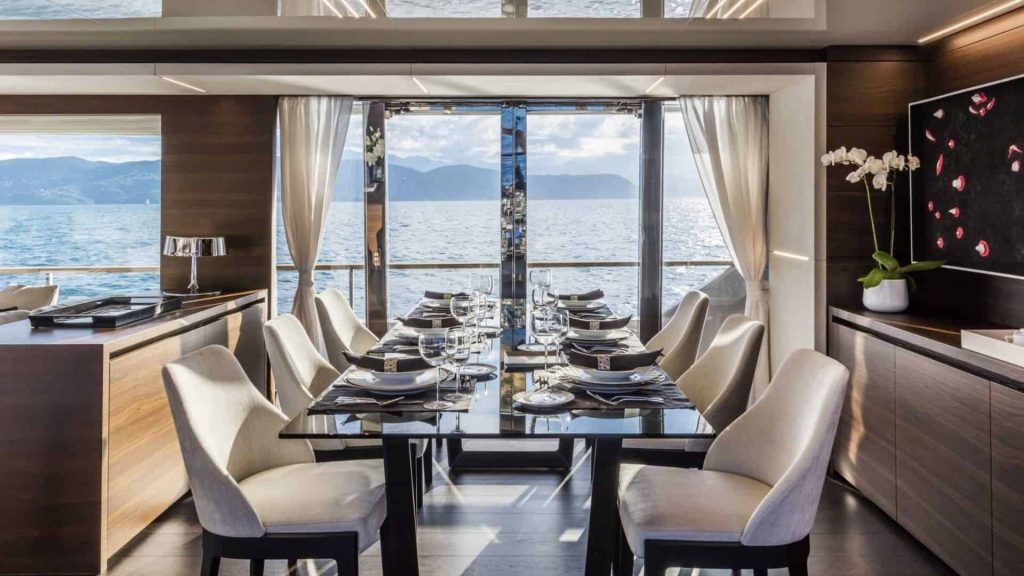 This is a photograph of a Custom Line Navetta 37 Dinner area 01