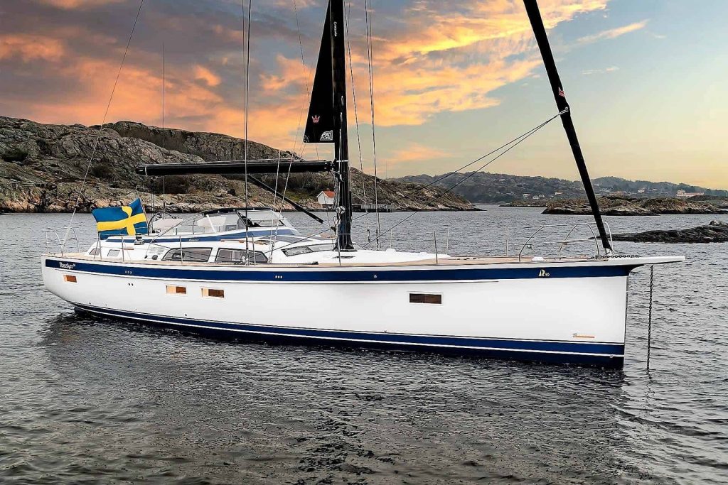 This is a photography of Hallberg Rassy 50 at anchor