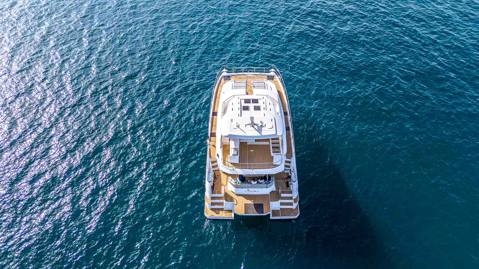 Side view of the By My Side catamaran