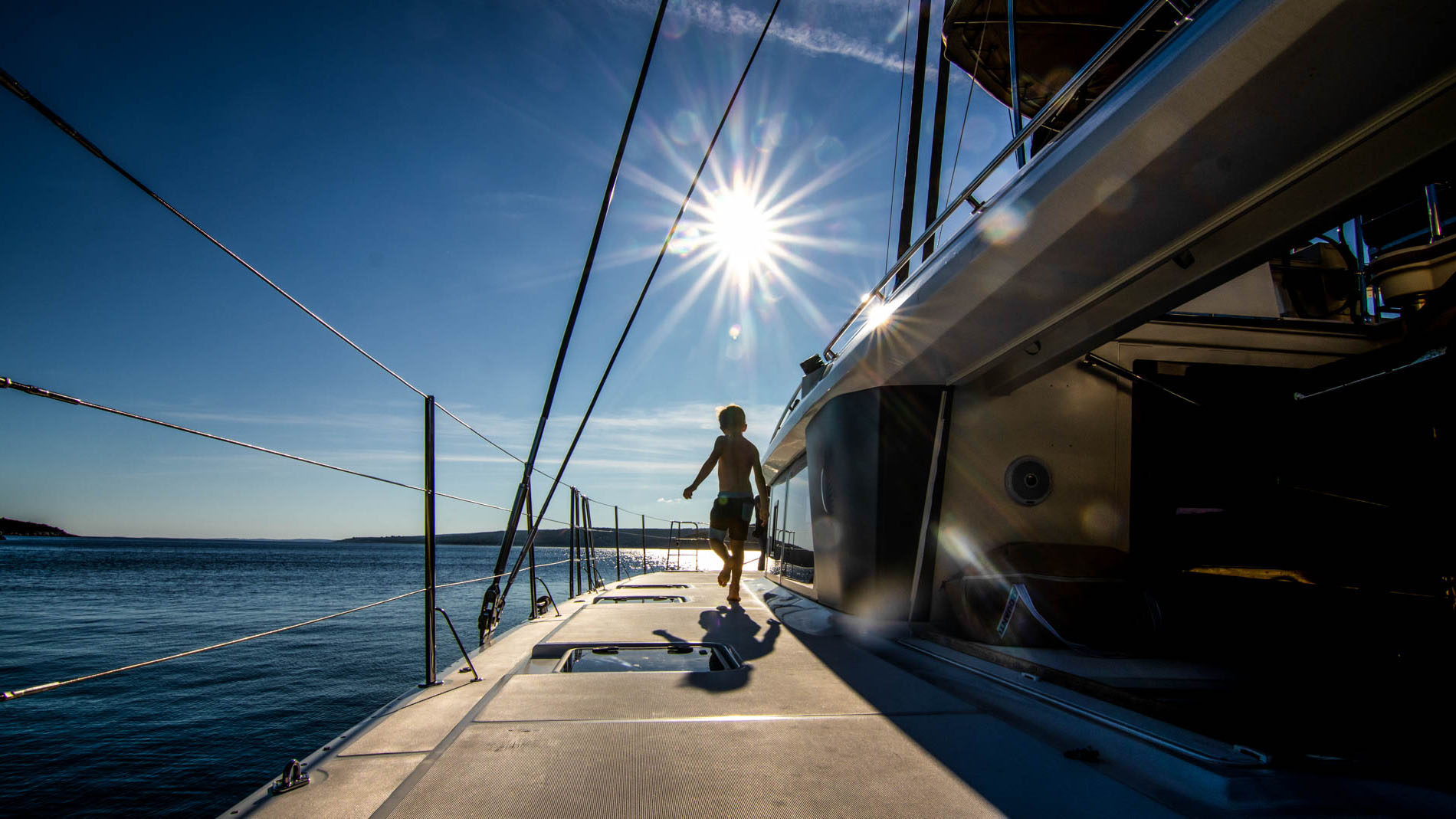 Side view of the Lagoon 560 S2 catamaran