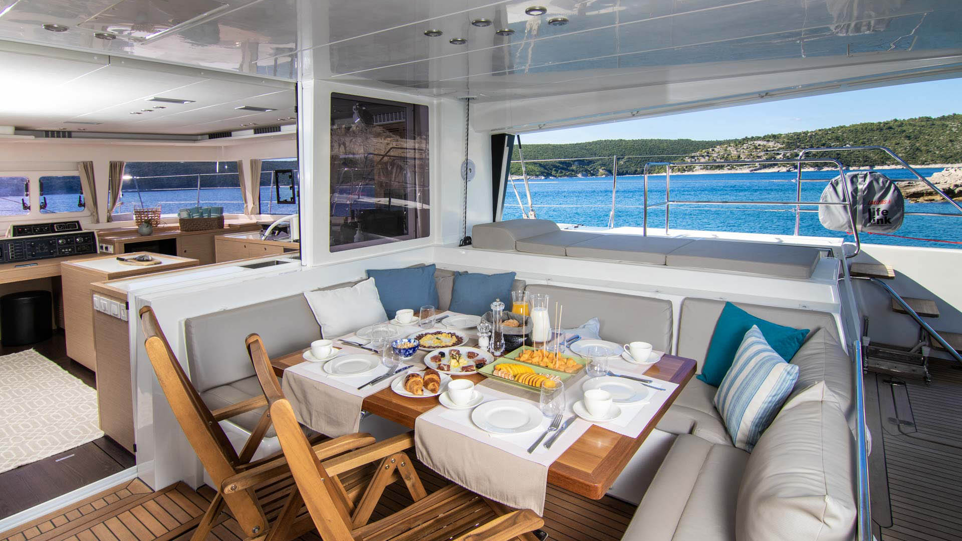 Aft dining area of the Lagoon 560 S2 catamaran