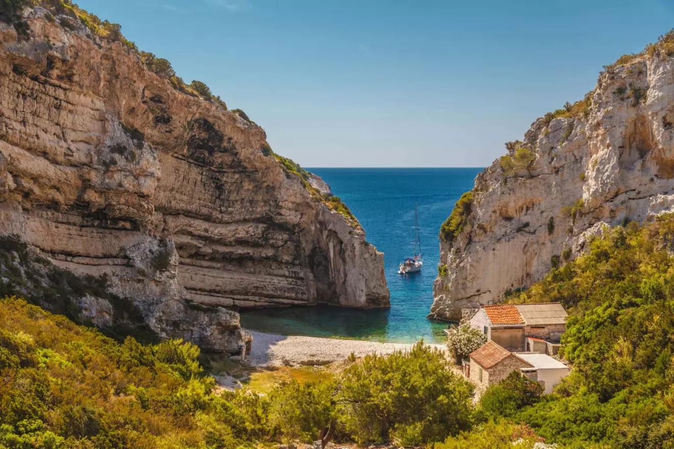 Dramatic cliffs and crystal-clear waters at Stiniva Beach, one of Croatia's secluded beaches