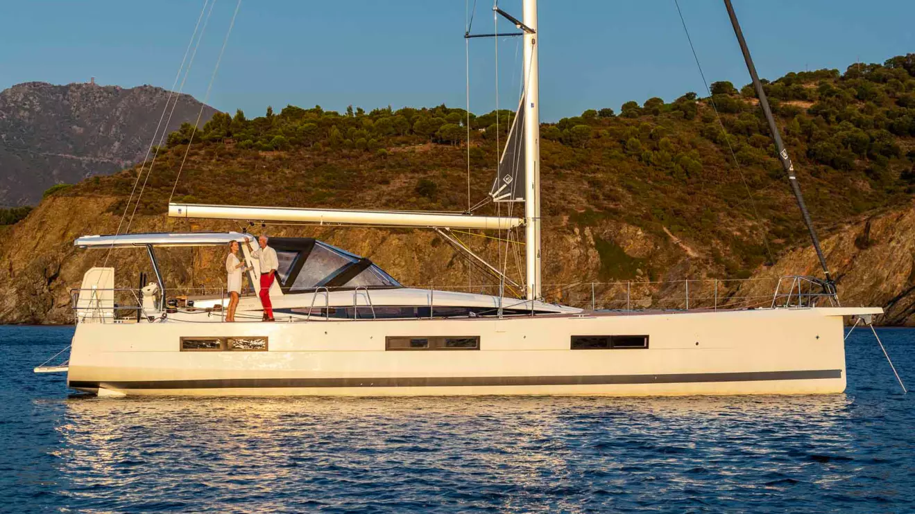 Jeanneau Yachts 60 anchored at sunset, a luxury sailing boat rental Croatia choice.