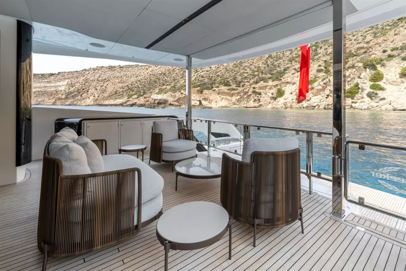 Main deck aft cockpit of Sunseeker Ocean 82 yacht featuring custom Minotti lounge seating layout