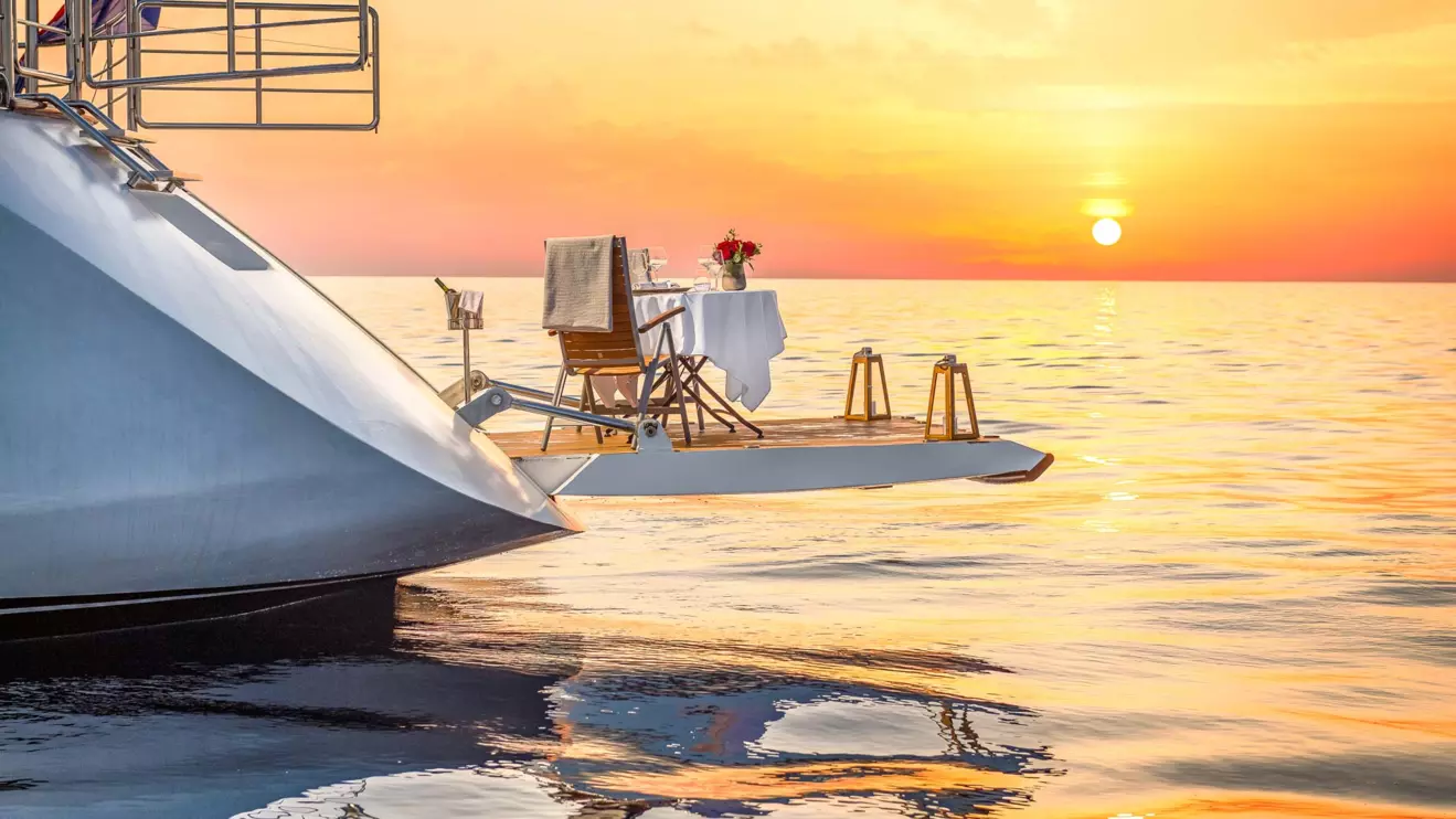 Lady Gita platform at sunset on honeymoon charter