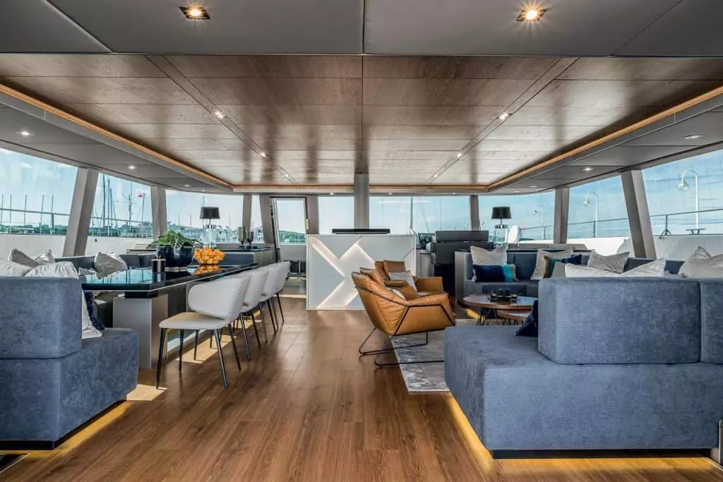 The spacious salon of an 80 Sunreef sailing catamaran.