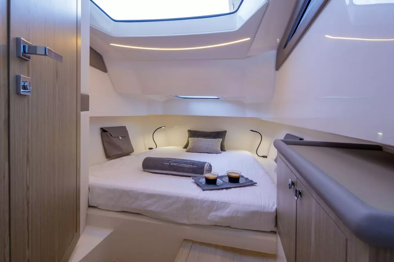 Technohull Alpha 40 cabin: Double berth, shower, 1.85m headroom.