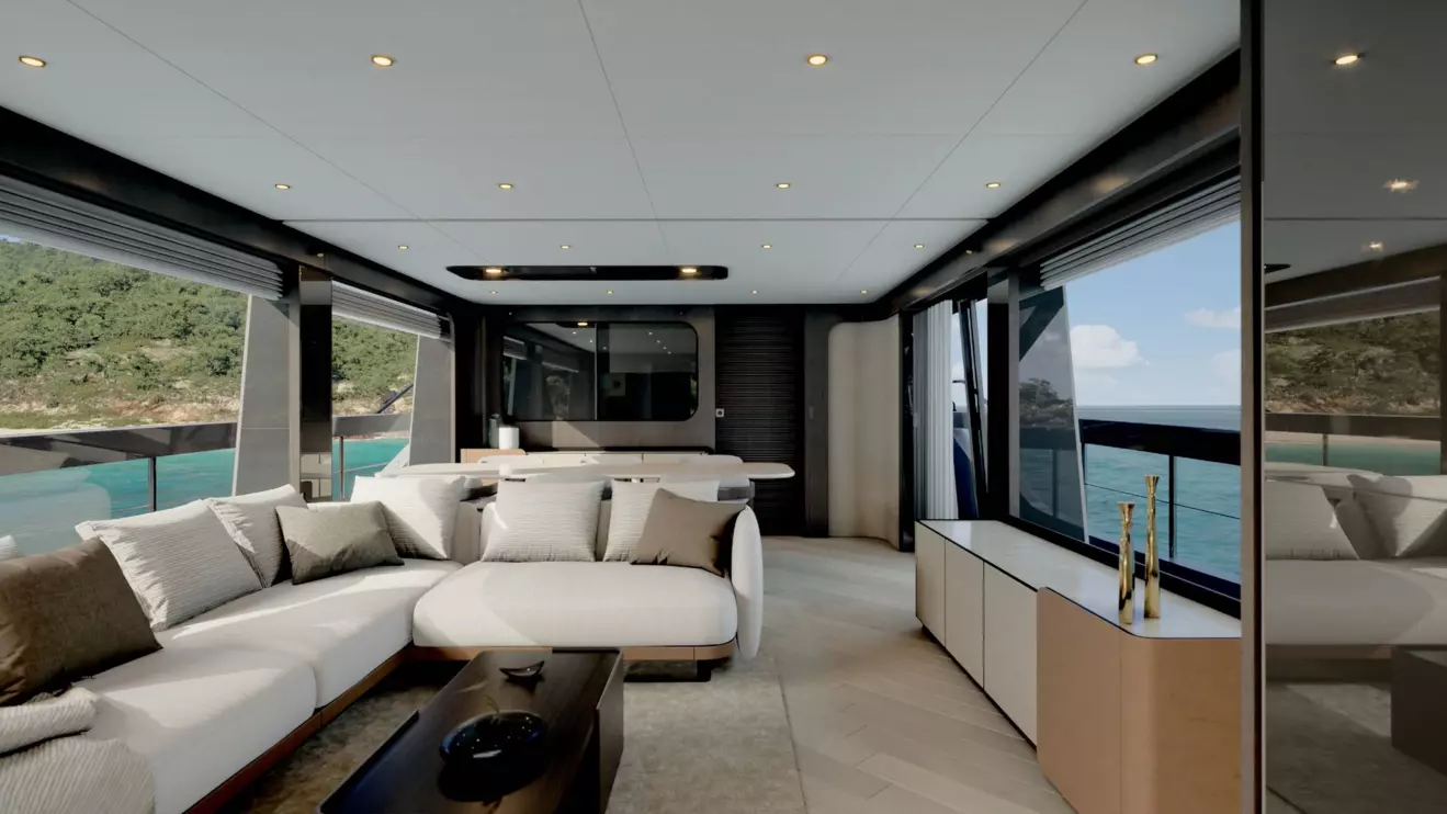 Ferretti Yachts 800 salon with expansive windows, showcasing panoramic sea views.
