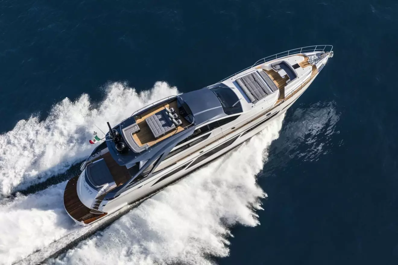 An aerial view of a Pershing 9X yacht cruising