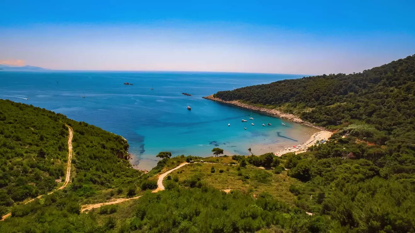 Crystal-clear waters and white sand at Šunj Beach, Lopud Island