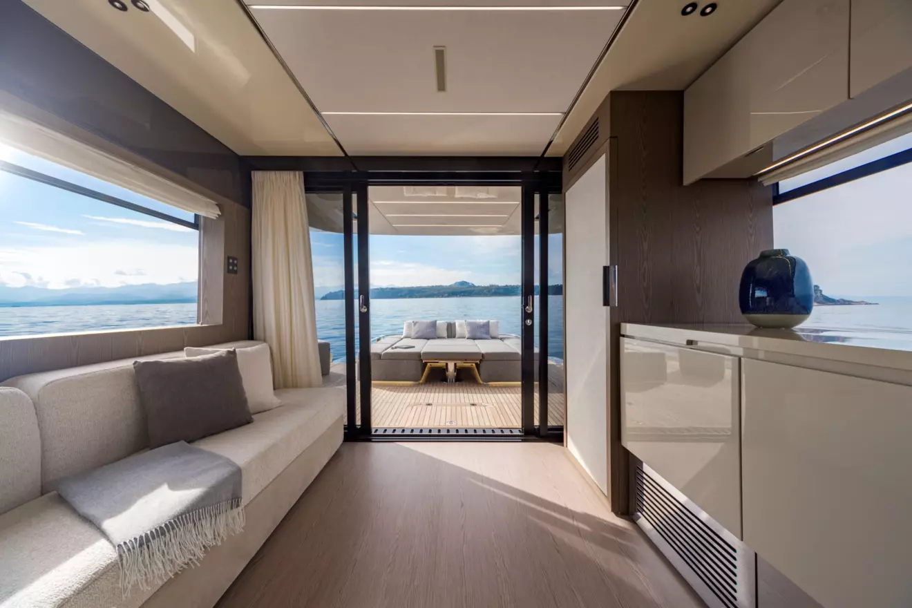 Invictus ST550 interior salon, modern kitchen, large windows, luxury cabins.