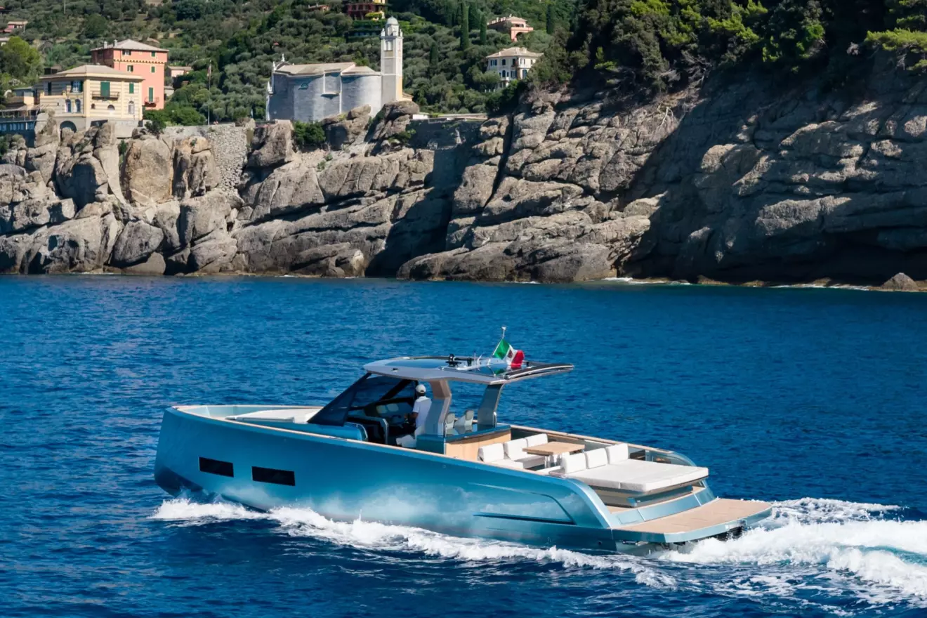New metallic sky-blue Pardo 43 motor yacht cruising at sea
