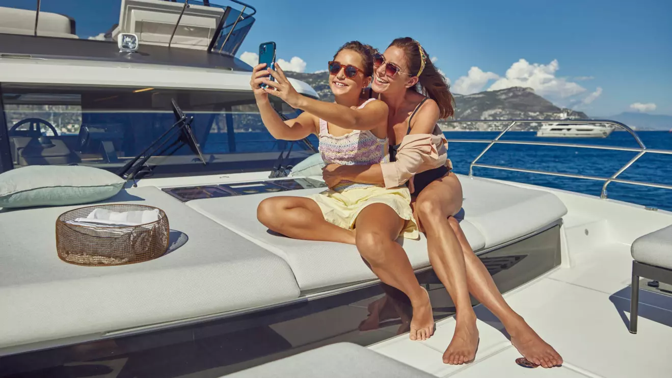 Luxury catamaran Prestige M48 foredeck lounge area