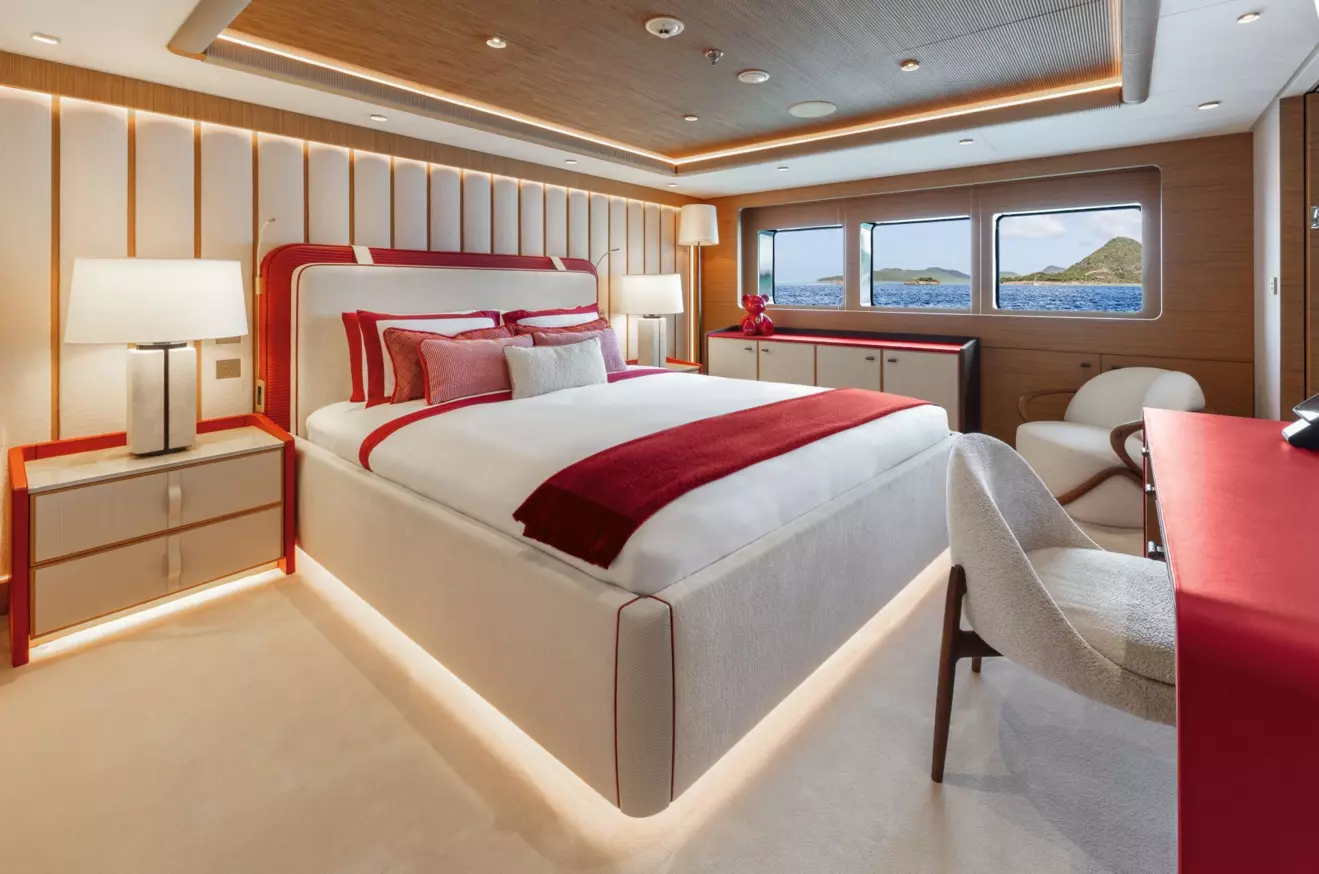 Red-themed luxury VIP guest cabin on the lower deck of superyacht Amor &agrave; Vida