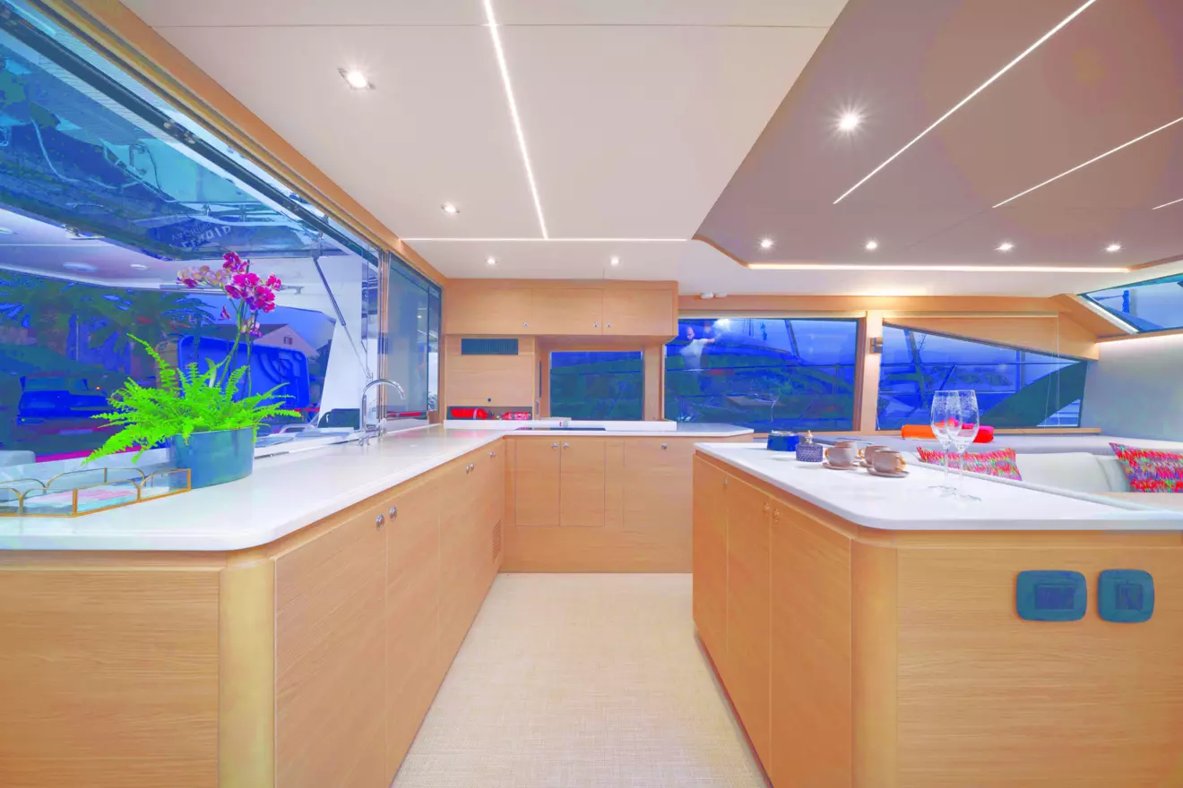 Modern kitchen on the Aquila 54 catamaran, with ample counter space and high-end appliances.