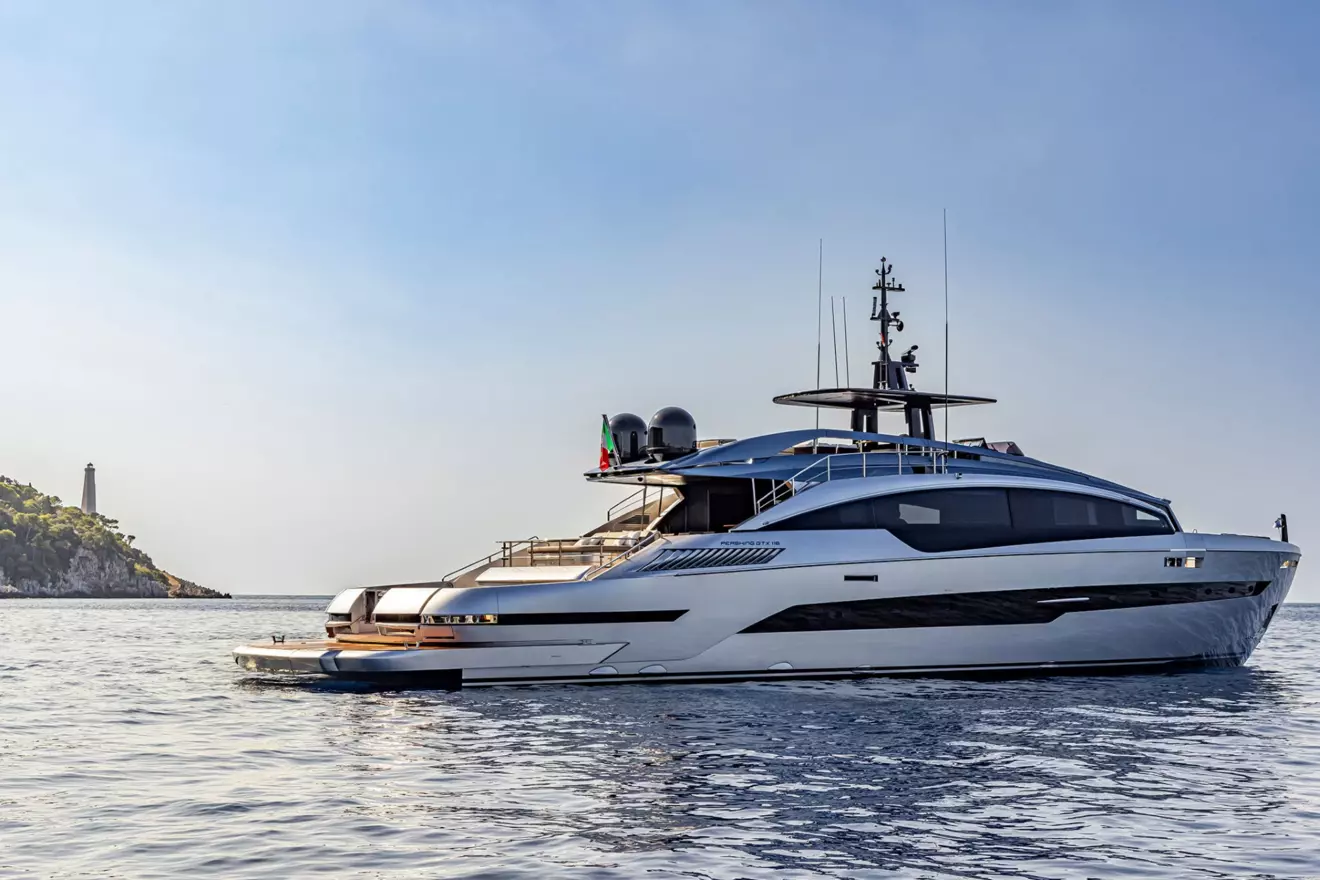 A silver Pershing GTX116 yacht on water