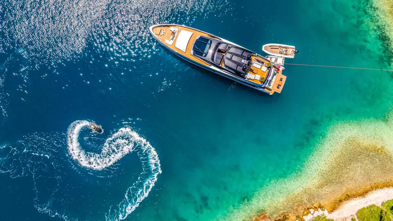 A luxury yacht navigating the Croatian islands, representing a dream vacation.