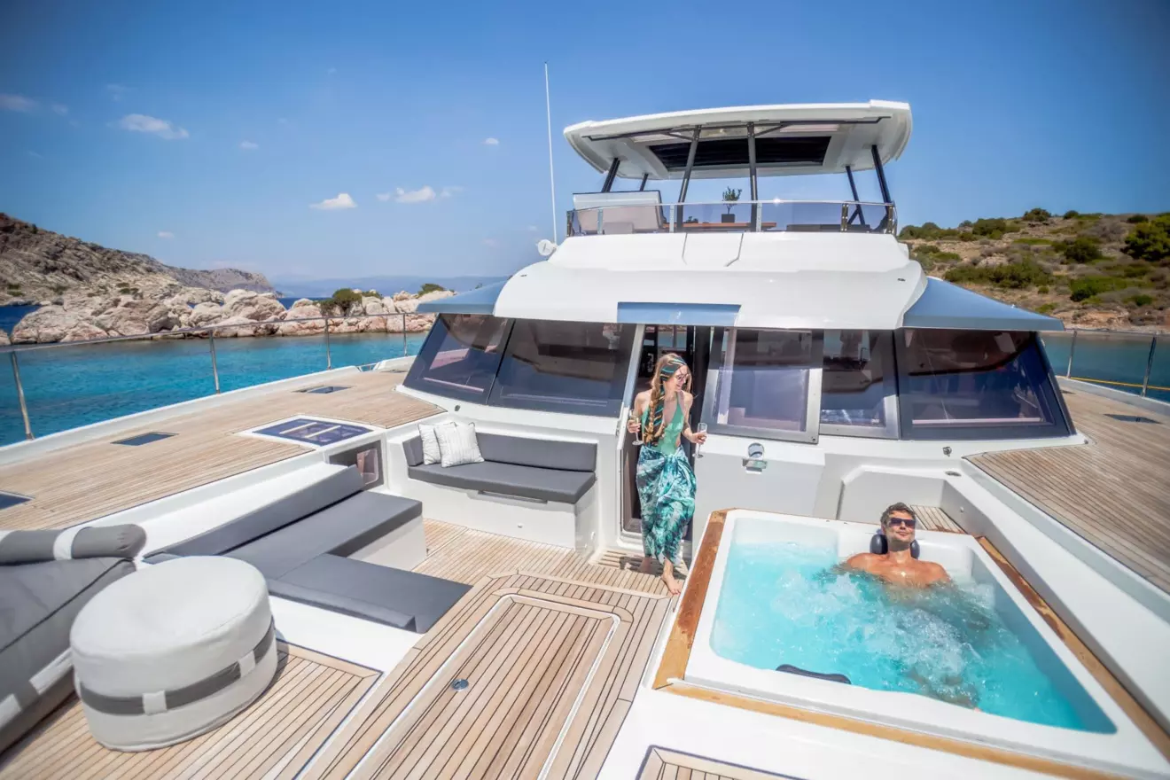 Fountaine Pajot Power 67 front cockpit with pool