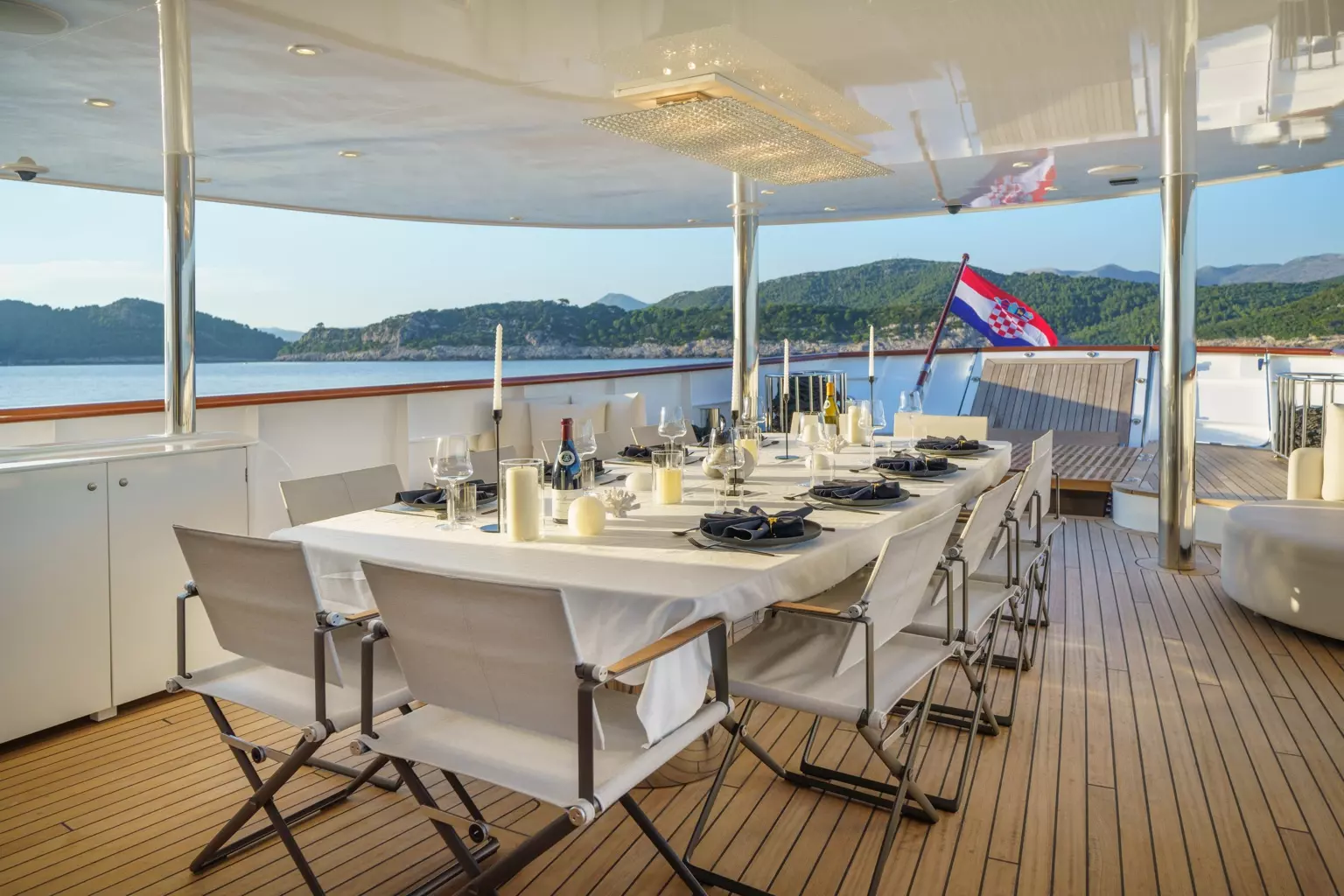 01_MAIA_aft_deck_formal_dining_setup.jpg