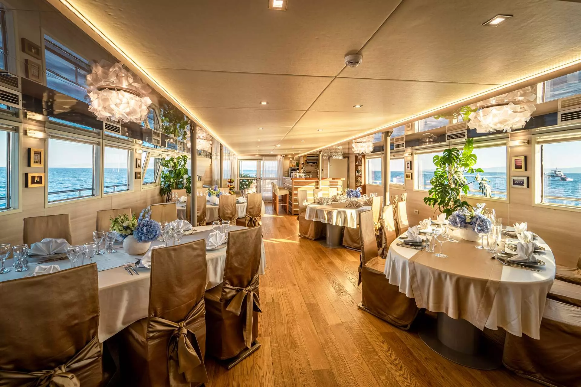 34. RIVA Formal dining in salon - Upper deck.jpg