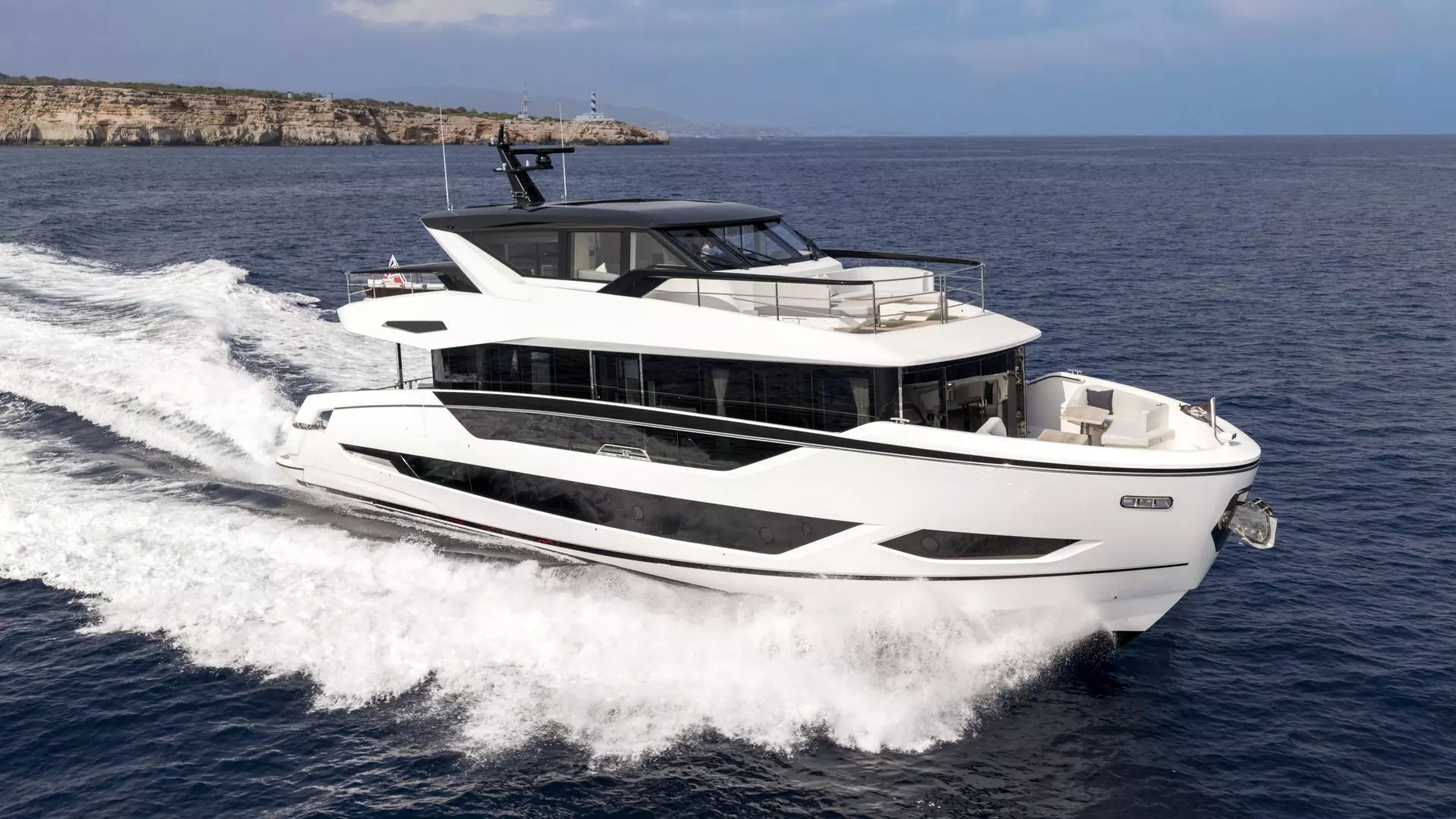 Sunseeker Ocean 82 Enclosed luxury motor yacht cruising at sea during sea trial