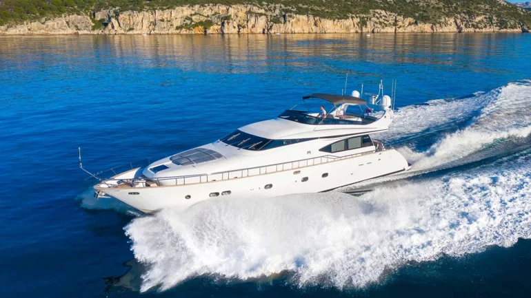Luxury yacht running across the sea