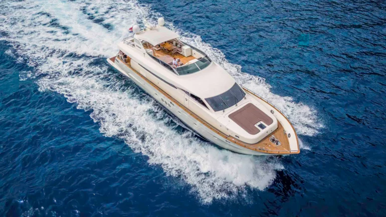 Luxury yacht running across the sea