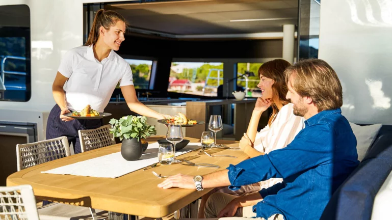 Stewardess serving food