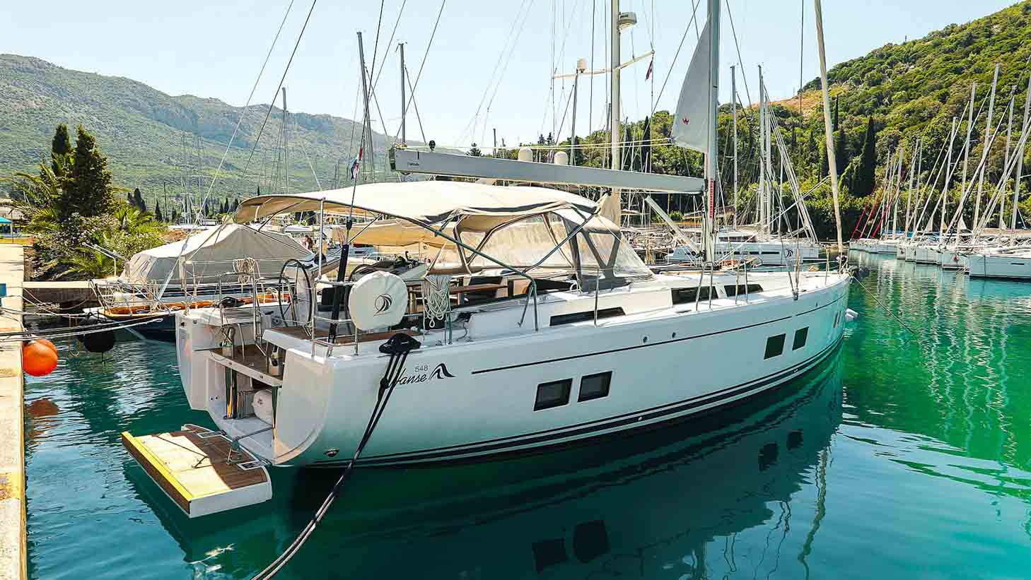 This is photo of a sailing boat Hanse 548 side view