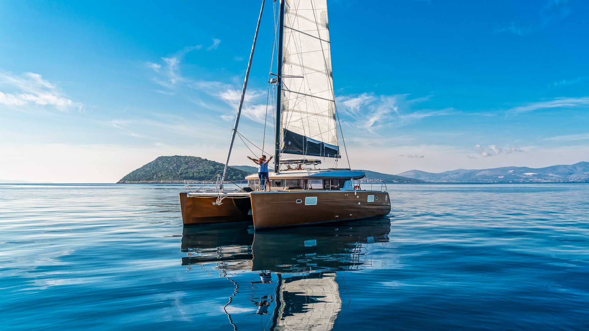 This is photo of a Lagoon 450 S Lux at anchor