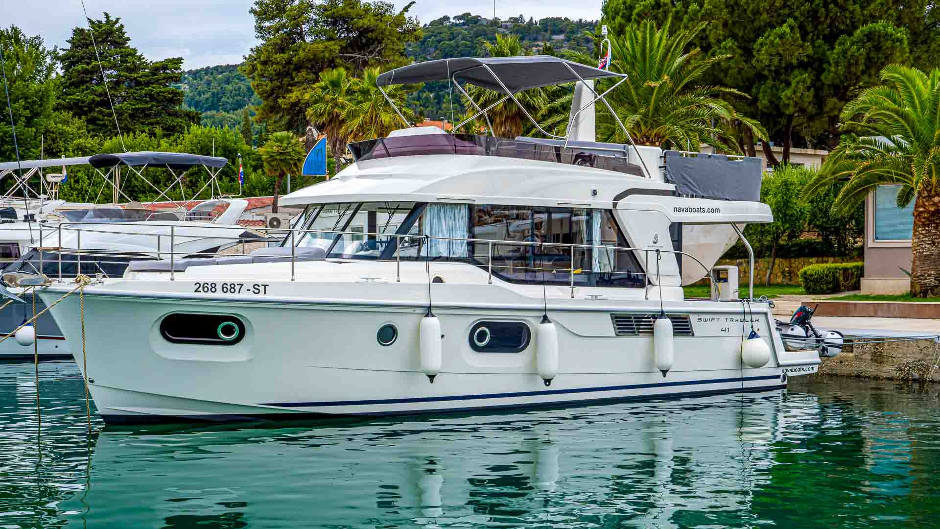 Motor boat Swift Trawler 41 in marina