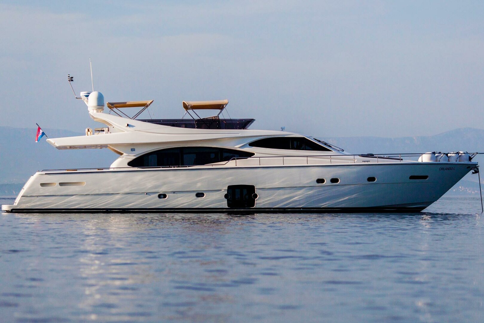 Luxury yacht Ferretti 780 Orlando L on anchor