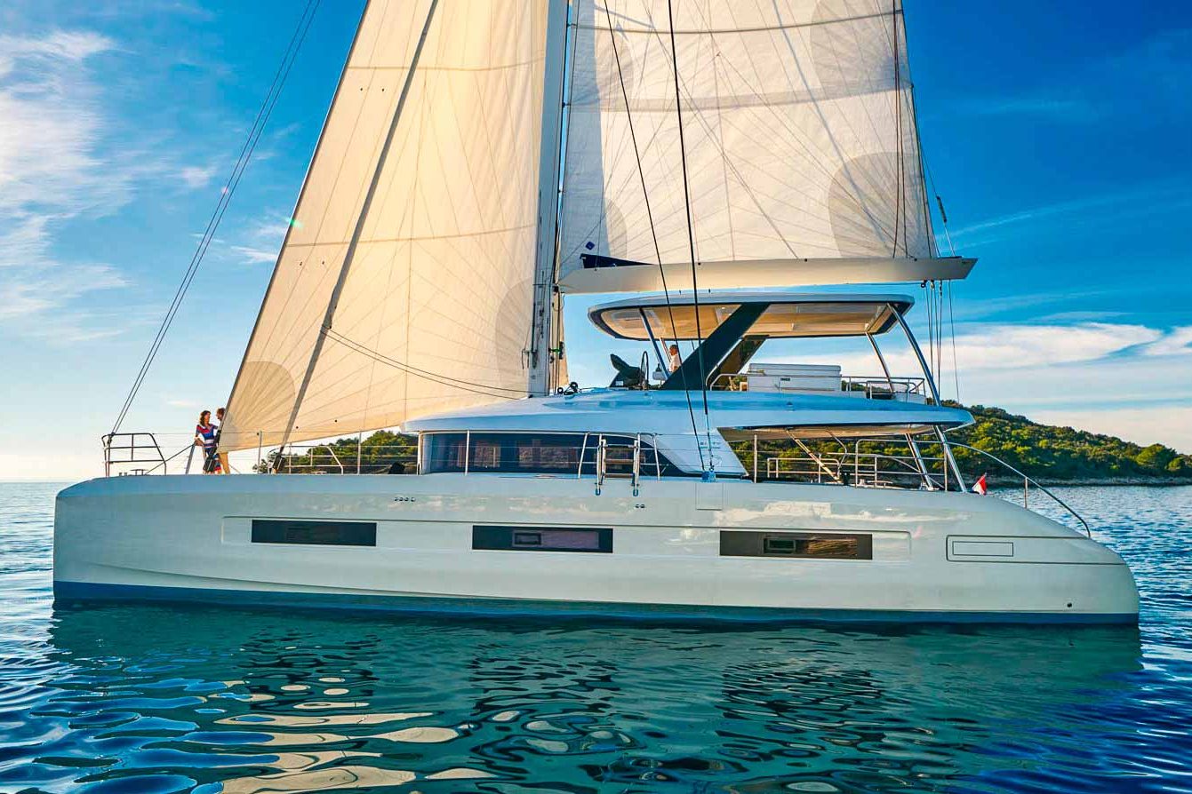 This is photo of a catamaran Lagoon Sixty5 named Amada Mia side view