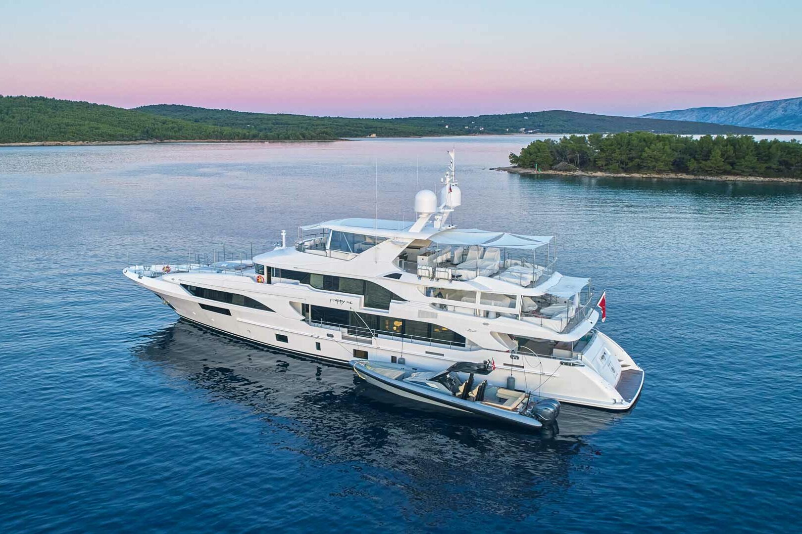 Luxury yacht Benetti Happy Me sunset port side