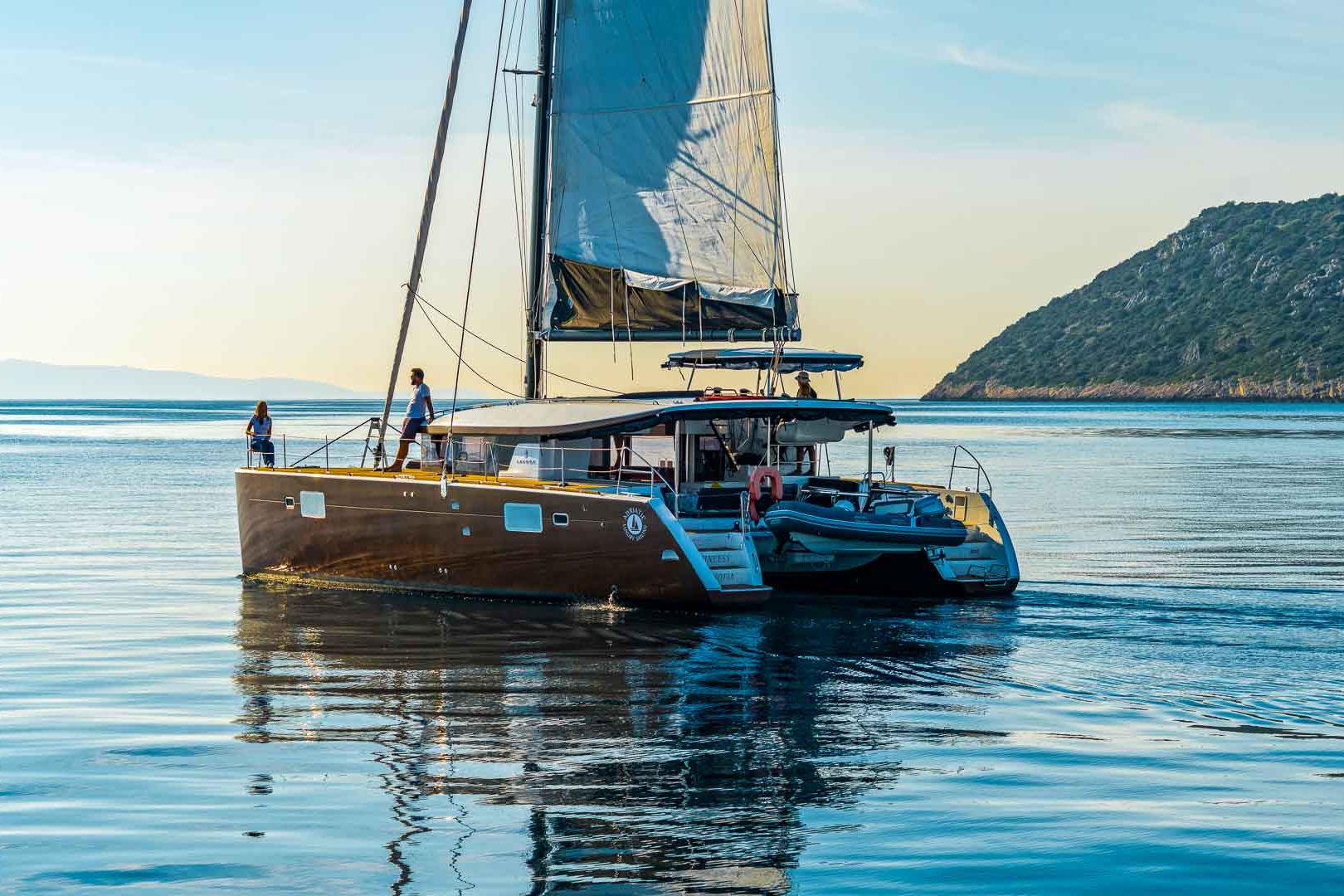 This is photo of a Lagoon 450 S Lux sailing side view