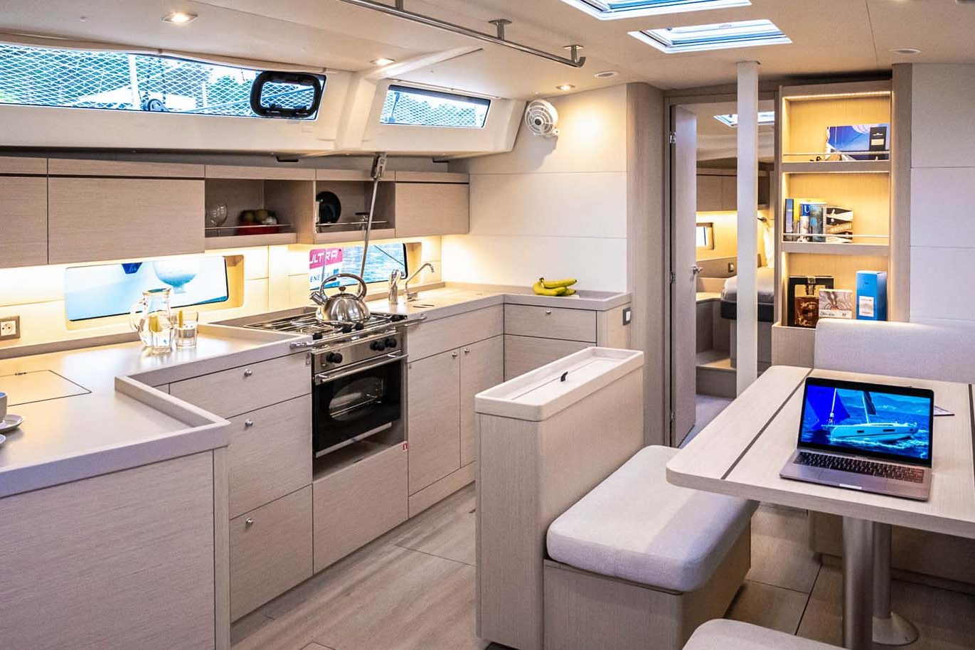 This is photo of a sailing boat Oceanis 46.1 saloon and kitchen view