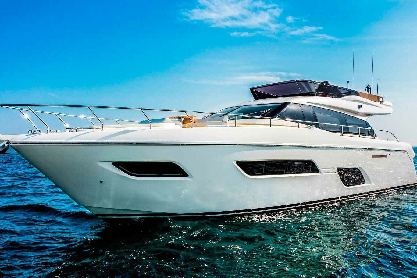 Motor boat Ferretti 550 on anchor