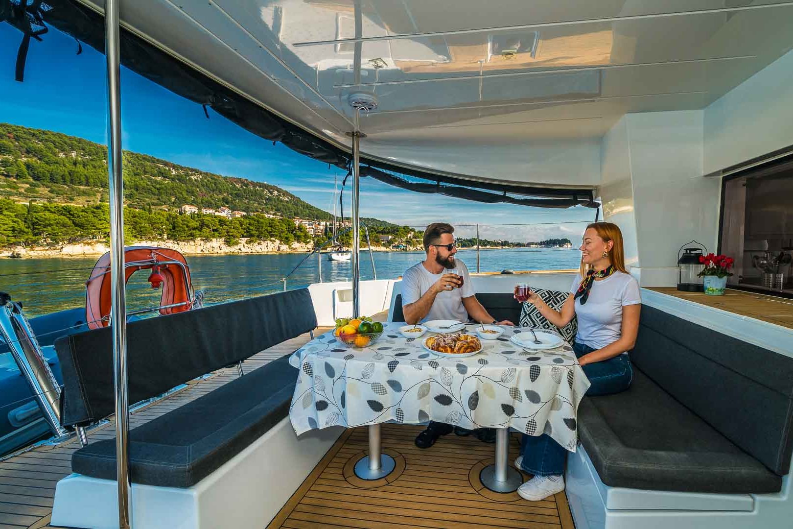 This is photo of a Lagoon 450 S Lux dining outside