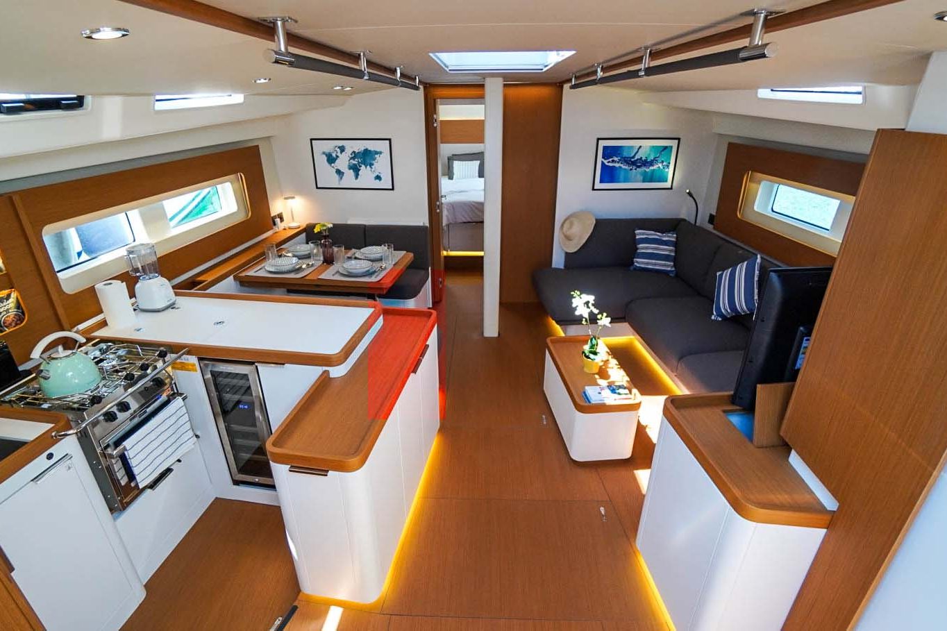 This is photo of a sailing boat First 53 saloon and kitchen view