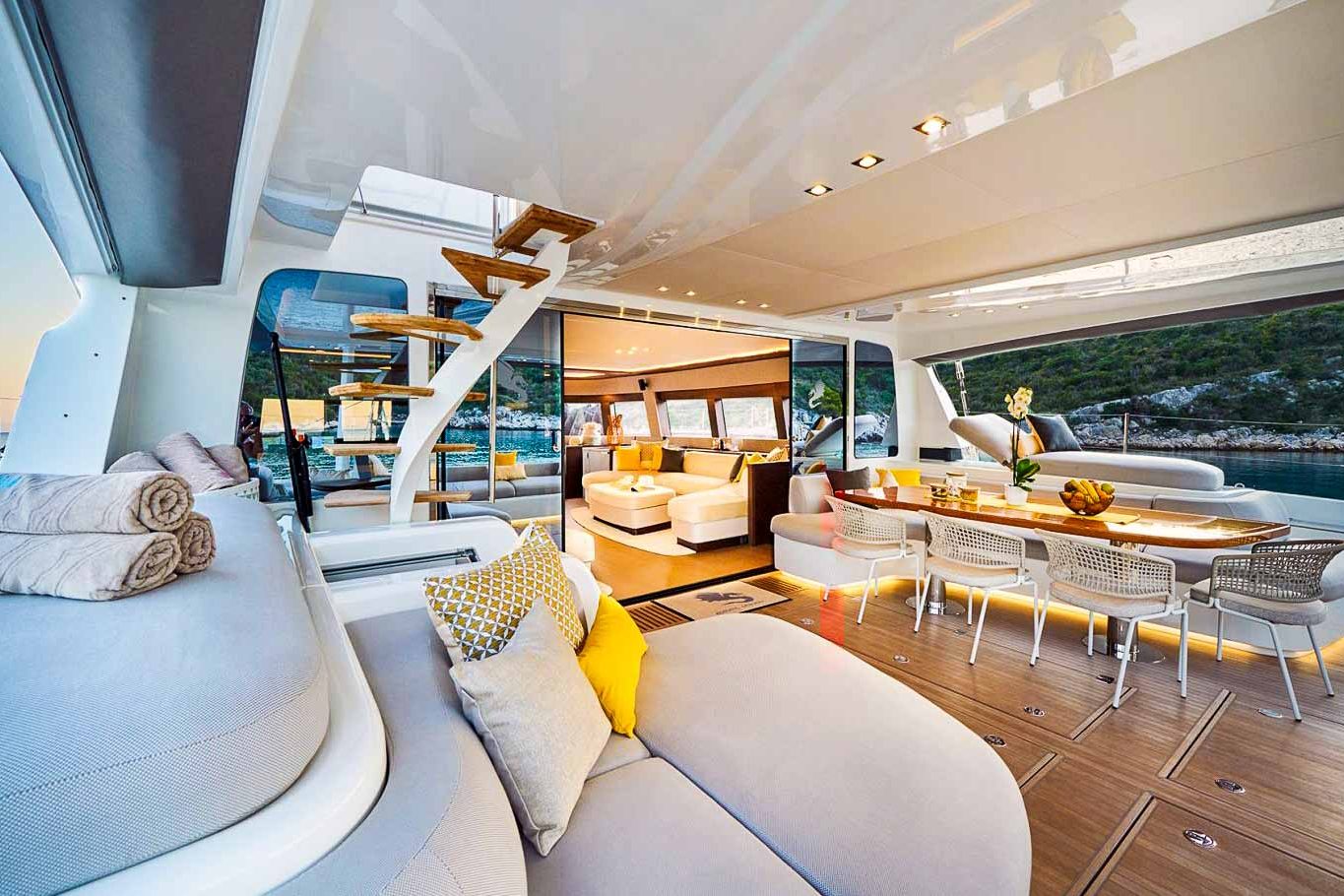 This is photo of a catamaran Lagoon 77 named Adriatic Dragon outside lounge area