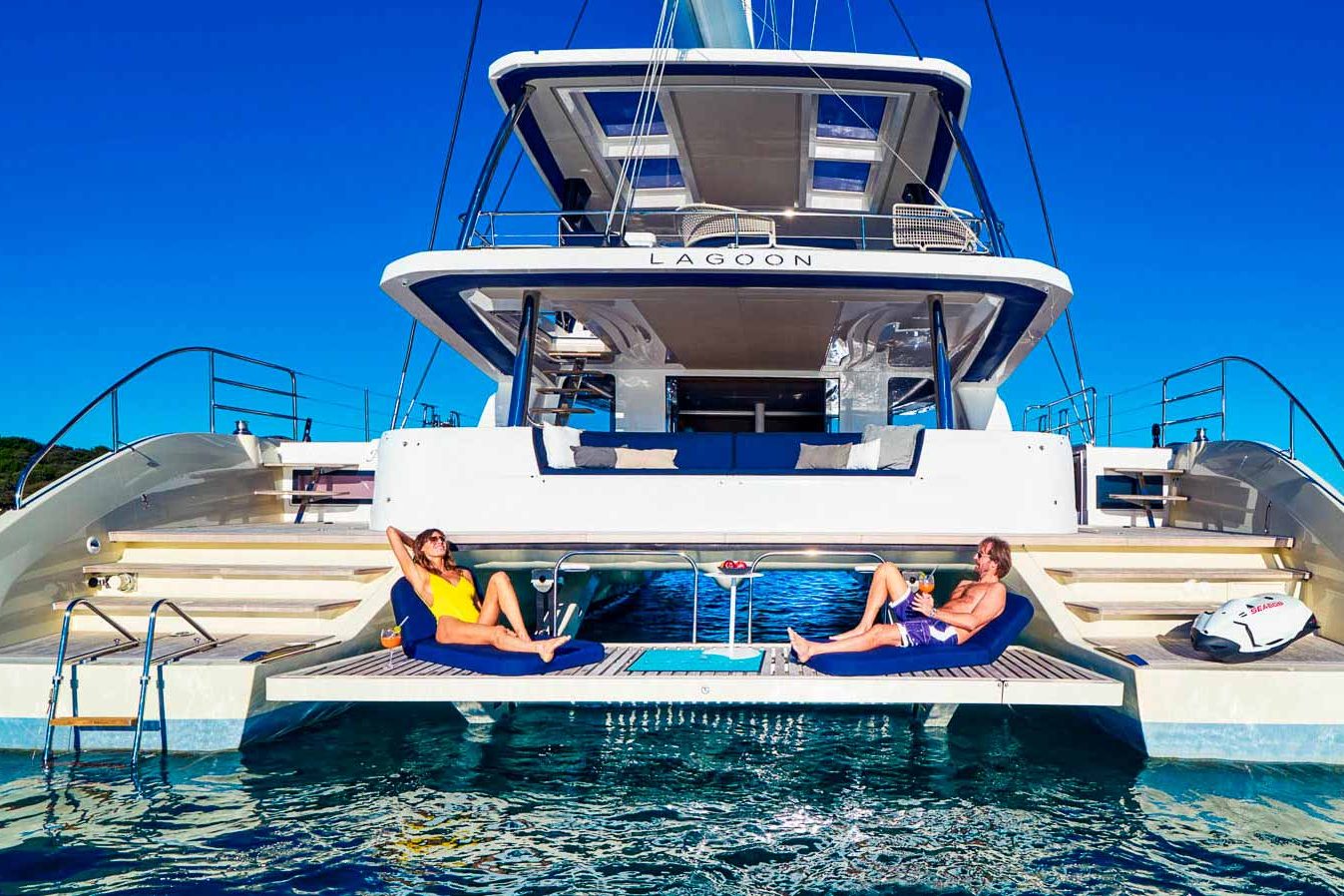 This is photo of a catamaran Lagoon Sixty5 named Amada Mia sunbathing platform