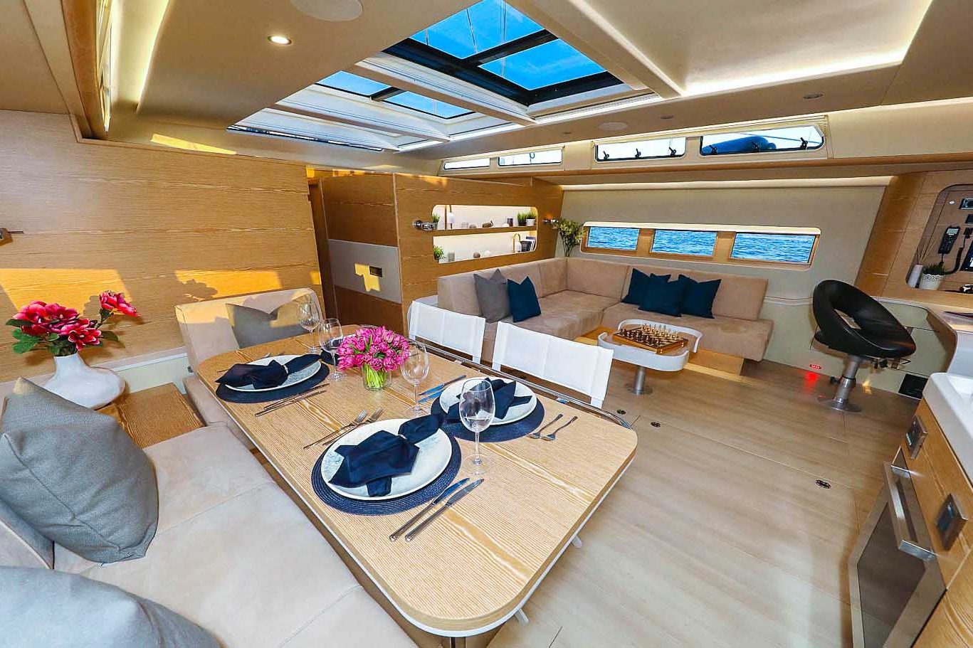 This is photo of a sailing boat Hanse 675 saloon and kitchen view