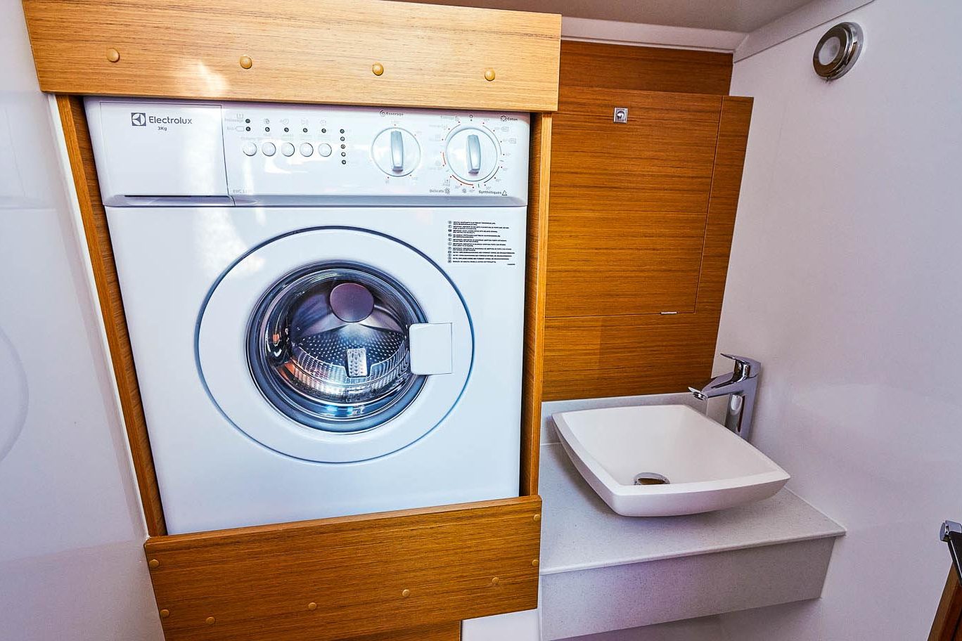 This is photo of a sailing boat Dufour 56 washing machine at toilette