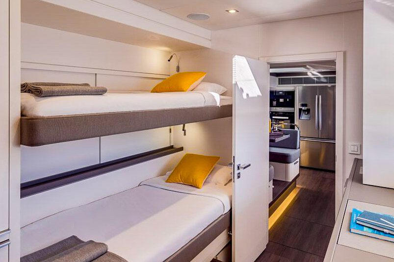 This is photo of a catamaran Lagoon 77 named Adriatic Dragon bunk bed cabin