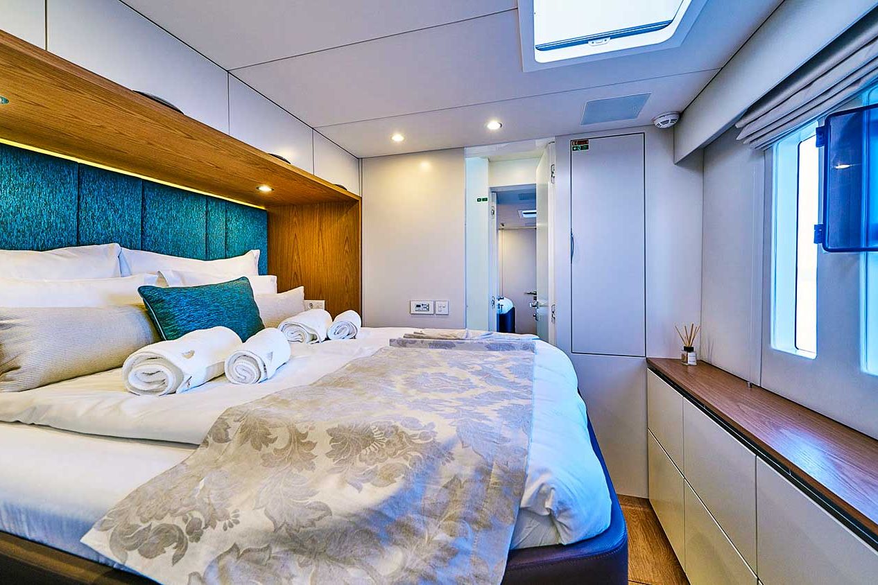 This is photo of a catamaran Sunreef 60 cabin double bed