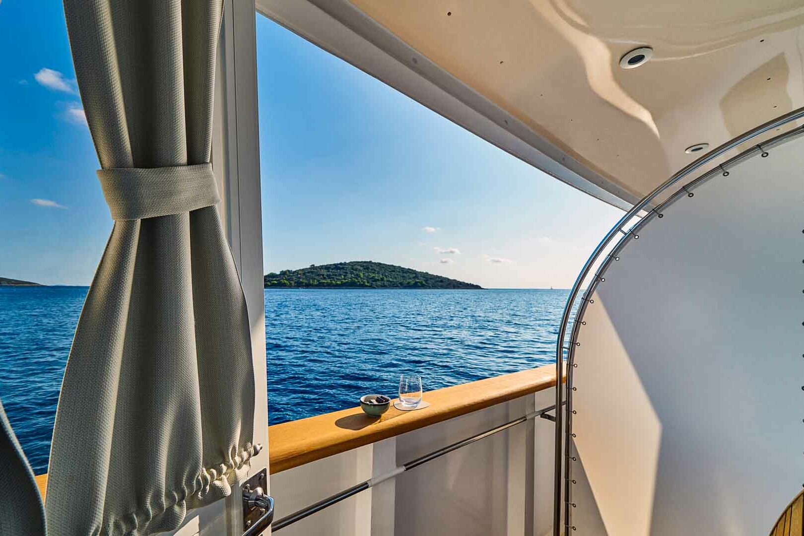 Luxury boutique yacht La Perla cabin balcony