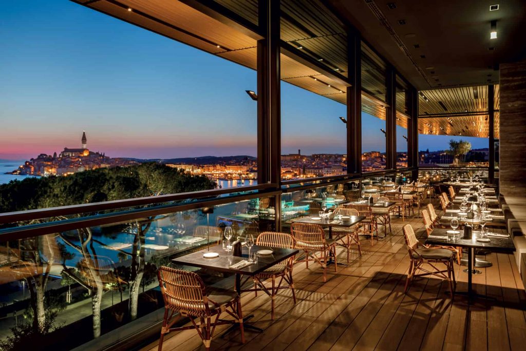 Cap Aureo restaurant terrace with panoramic views of Rovinj marina and old town