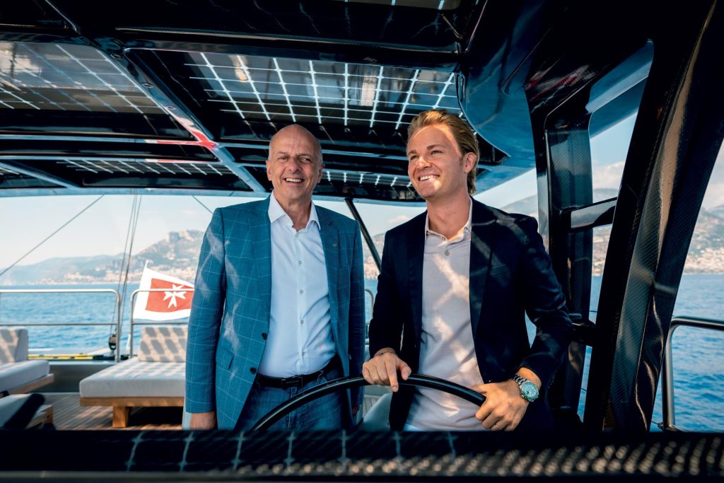 This is photo of a Francis Lapp and Nico Rosberg