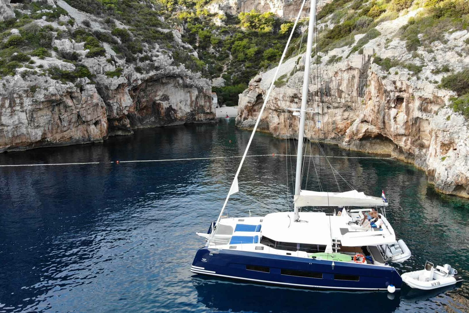 Luxury Catamaran Charter Dufour 48 on anchor Stiniva Bay