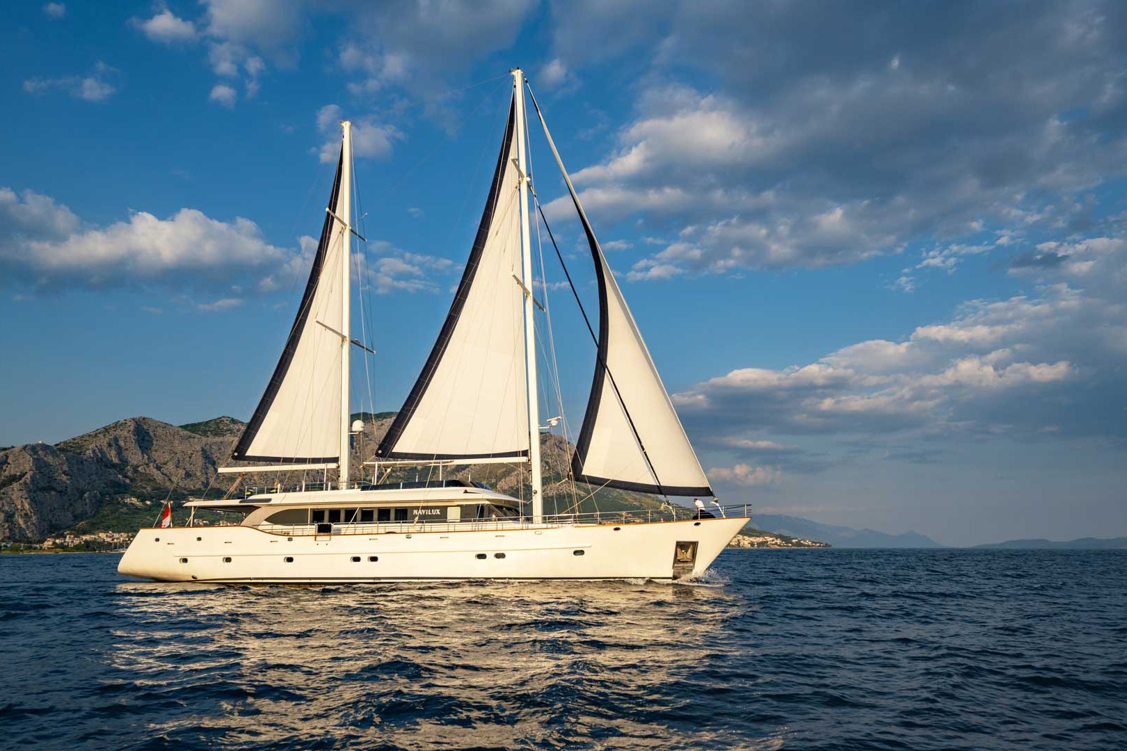 The luxury sailing yacht Navilux sailing side view